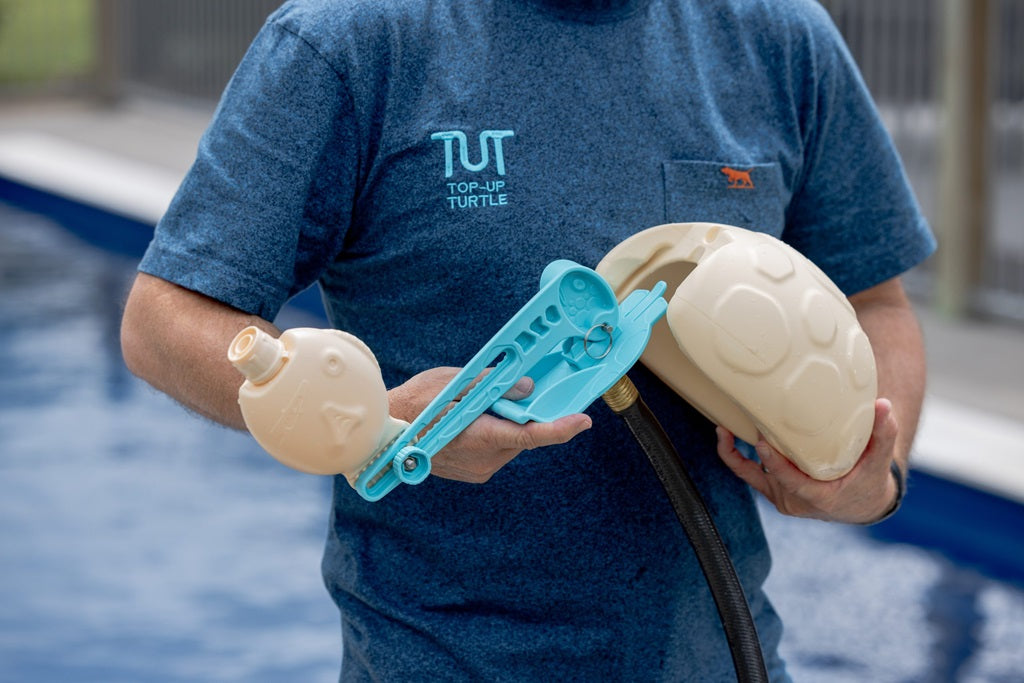 TOP-UP TURTLE Automatic pool top-up valve. Pictured in hand. MPN TUT.