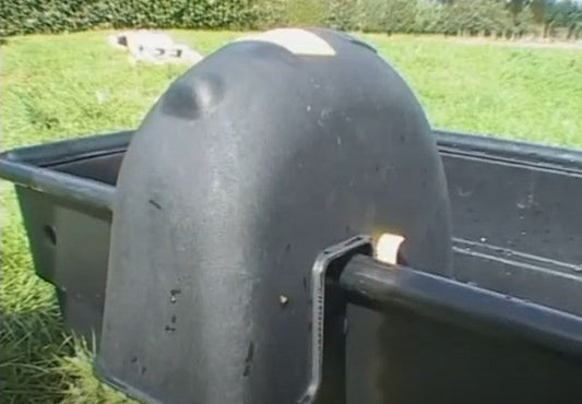 Protect-A-Mount installed on a livestock trough